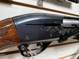 Used Remington 1100 12 gauge 21 " smooth bore deer barrel + 28" field barrel fixed choke modwith leather strap good working condition - 23 of 25