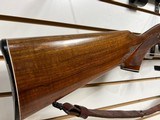 Used Remington 1100 12 gauge 21 " smooth bore deer barrel + 28" field barrel fixed choke modwith leather strap good working condition - 10 of 25