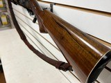 Used Remington 1100 12 gauge 21 " smooth bore deer barrel + 28" field barrel fixed choke modwith leather strap good working condition - 4 of 25