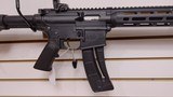 Used Smith and Wesson M&P 15/22 22LR16" barrel 1 25 round mag adjustable stock flip up front and rear sights good working condition - 14 of 19
