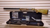 New Blaser F16 Sporting 12 Gauge 32"
barrel
receiver and forearm socks 5 chokes choke wrench lube manuals luggage case new in box - 1 of 23