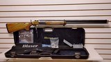 New Blaser F16 Sporting 12 Gauge 32"
barrel
receiver and forearm socks 5 chokes choke wrench lube manuals luggage case new in box - 16 of 23