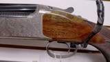 Slightly Used Left Handed Browning 425 Sporter 12 Gauge 30" barrel
3 chokes 1 mod 1 skeet 1 IC choke wrench trigger shoe lock original box - 10 of 25