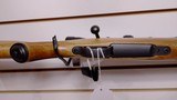 Lightly Used Kimber 84M 257 Roberts 22" barrel Leupold Scope with lens covers leather strap very good condition - 23 of 25