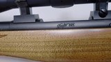 Lightly Used Kimber 84M 257 Roberts 22" barrel Leupold Scope with lens covers leather strap very good condition - 2 of 25