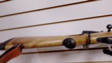 Lightly Used Kimber 84M 257 Roberts 22" barrel Leupold Scope with lens covers leather strap very good condition - 24 of 25