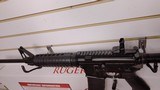 New Ruger AR556 16" barrel 5.56 nato flip up rear sights fixed front sightblack anodized/black oxide 1 30 round mag adj stock new in box lock m - 14 of 21