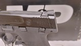 New S&W M&P2.0 9mm Shield 3" barrel 2 mags crimson trace built-in lock manual new in box sku 11671 - 4 of 24