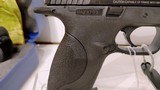 Lightly used smith & wesson M&P 9 4 1/4" barrel 2 mags grip adjuster manuals hard plastic case lock reduced - 15 of 18