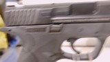 Lightly used smith & wesson M&P 9 4 1/4" barrel 2 mags grip adjuster manuals hard plastic case lock reduced - 10 of 18
