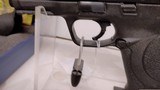 Lightly used smith & wesson M&P 9 4 1/4" barrel 2 mags grip adjuster manuals hard plastic case lock reduced - 2 of 18