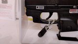 Used ruger LCP 2.5" barrel .380 cal crimson trace red dot built in soft holster lock manuals original box reduced - 5 of 20