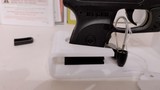 Used ruger LCP 2.5" barrel .380 cal crimson trace red dot built in soft holster lock manuals original box reduced - 12 of 20