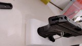 Used ruger LCP 2.5" barrel .380 cal crimson trace red dot built in soft holster lock manuals original box reduced - 19 of 20