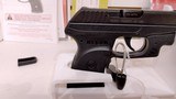 Used ruger LCP 2.5" barrel .380 cal crimson trace red dot built in soft holster lock manuals original box reduced - 13 of 20