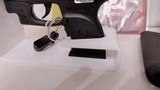 Used ruger LCP 2.5" barrel .380 cal crimson trace red dot built in soft holster lock manuals original box reduced - 3 of 20