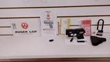 Used ruger LCP 2.5" barrel .380 cal crimson trace red dot built in soft holster lock manuals original box reduced - 1 of 20