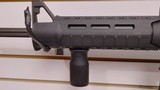Used Bushmaster XM15-E2S 16" 5.56x.223 1 30 round magazine foregrip fixed stock very good condition - 13 of 24