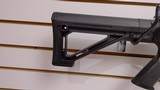 Used Bushmaster XM15-E2S 16" 5.56x.223 1 30 round magazine foregrip fixed stock very good condition - 10 of 24