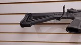 Used Bushmaster XM15-E2S 16" 5.56x.223 1 30 round magazine foregrip fixed stock very good condition - 22 of 24