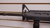 Used Bushmaster XM15-E2S 16" 5.56x.223 1 30 round magazine foregrip fixed stock very good condition - 15 of 24