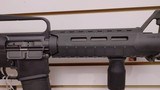 Used Bushmaster XM15-E2S 16" 5.56x.223 1 30 round magazine foregrip fixed stock very good condition - 21 of 24