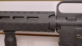 Used Bushmaster XM15-E2S 16" 5.56x.223 1 30 round magazine foregrip fixed stock very good condition - 11 of 24