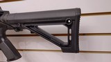 Used Bushmaster XM15-E2S 16" 5.56x.223 1 30 round magazine foregrip fixed stock very good condition - 3 of 24