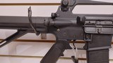 Used Bushmaster XM15-E2S 16" 5.56x.223 1 30 round magazine foregrip fixed stock very good condition - 17 of 24