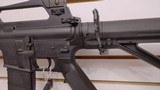 Used Bushmaster XM15-E2S 16" 5.56x.223 1 30 round magazine foregrip fixed stock very good condition - 4 of 24