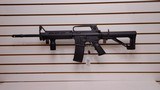 Used Bushmaster XM15-E2S 16" 5.56x.223 1 30 round magazine foregrip fixed stock very good condition - 2 of 24