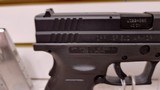 Used Springfield XD 40S&W 4" factory compensated barrel 8 magazines range bag cleaning brush original manual and spent shell reduced - 12 of 21