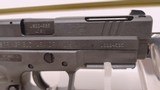 Used Springfield XD 40S&W 4" factory compensated barrel 8 magazines range bag cleaning brush original manual and spent shell reduced - 18 of 21