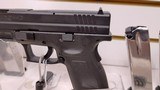 Used Springfield XD 40S&W 4" factory compensated barrel 8 magazines range bag cleaning brush original manual and spent shell reduced - 7 of 21