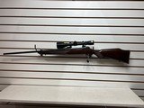 Savage 110 7mm Remington Bolt Action Redfield 3X9X Scope - 1 of 25