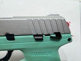 new ruger EC9S 9MM 3.12 Turquoise FS1/7rd. new in the box 2 in stock - 6 of 13