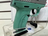 new ruger EC9S 9MM 3.12 Turquoise FS1/7rd. new in the box 2 in stock - 8 of 13