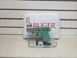 new ruger EC9S 9MM 3.12 Turquoise FS1/7rd. new in the box 2 in stock - 1 of 13