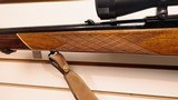 Used Weatherby Mark XXII 22LR 24" barrel tasco scope with covers leather strap good condition - 10 of 25