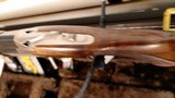Used Browning 725 20 gauge sporting 30" barrel3 chokes 2 extra trigger shoes spare sight with holder lock luggage case good condition - 10 of 23