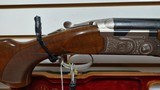 Used Beretta 686 Silver Pigeon 12 gauge 29 1/2" barrel14 1/2" LOP 4 chokes 1 skt 1 full 1 mod 1 imp cyl luggage case good condition - 15 of 25