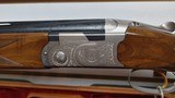 Used Beretta 686 Silver Pigeon 12 gauge 29 1/2" barrel14 1/2" LOP 4 chokes 1 skt 1 full 1 mod 1 imp cyl luggage case good condition - 8 of 25