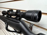 Used Remington Model 597 22 mag 19" barrel black synthetic stock and forearm golden antler scope good condition - 7 of 20