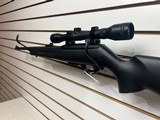 Used Remington Model 597 22 mag 19" barrel black synthetic stock and forearm golden antler scope good condition - 10 of 20
