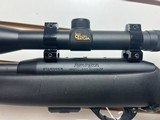 Used Remington Model 597 22 mag 19" barrel black synthetic stock and forearm golden antler scope good condition - 15 of 20