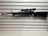 Used Remington Model 597 22 mag 19" barrel black synthetic stock and forearm golden antler scope good condition - 1 of 20
