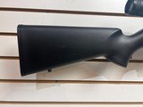Used Remington Model 597 22 mag 19" barrel black synthetic stock and forearm golden antler scope good condition - 11 of 20