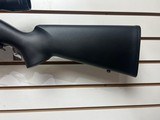 Used Remington Model 597 22 mag 19" barrel black synthetic stock and forearm golden antler scope good condition - 16 of 20