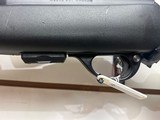 Used Remington Model 597 22 mag 19" barrel black synthetic stock and forearm golden antler scope good condition - 20 of 20