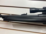 Used Remington Model 597 22 mag 19" barrel black synthetic stock and forearm golden antler scope good condition - 2 of 20